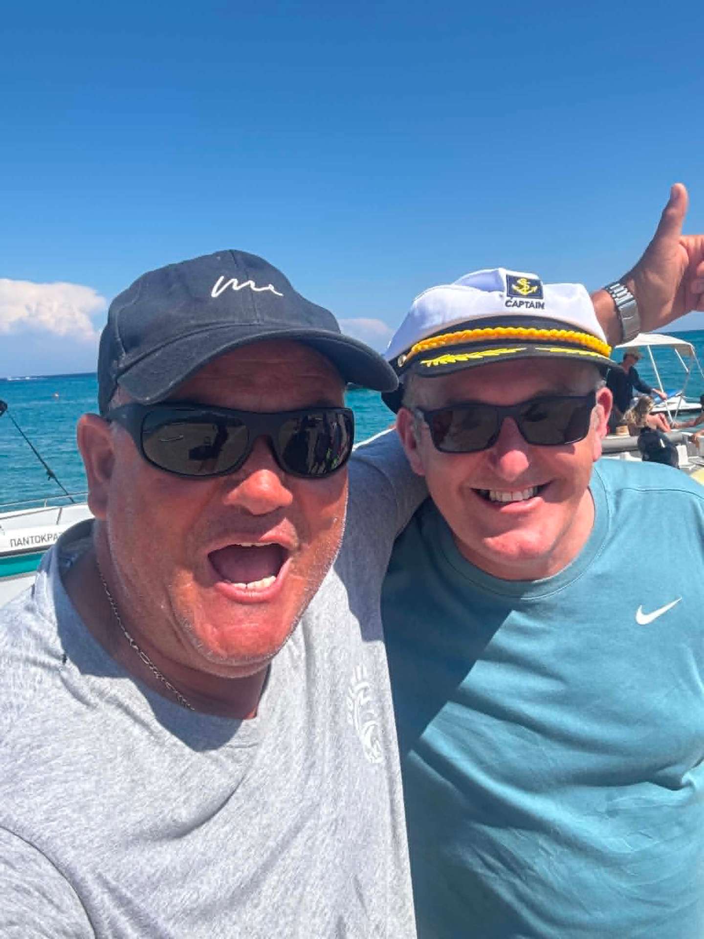Two Dolphin Ski Club captains on the beach